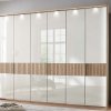 Šatní skříň s křídlovými dveřmi a rámem VENTURA, bílé sklo / dub bianco – 300 cm